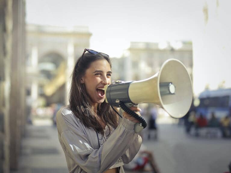 how to get clients woman shouting on bullhorn