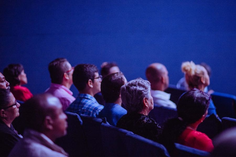 a group of people in a theater