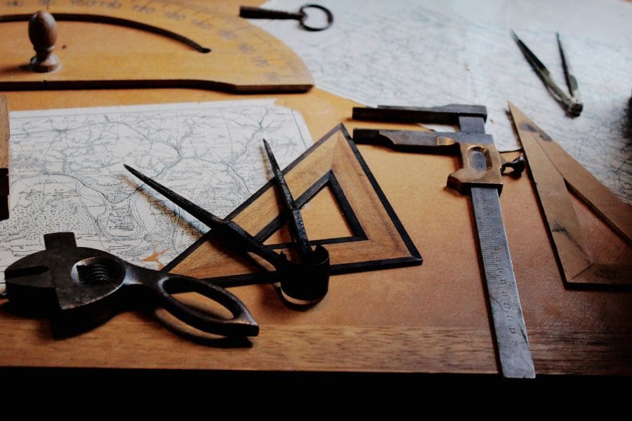 a tabletop of drafting tools
