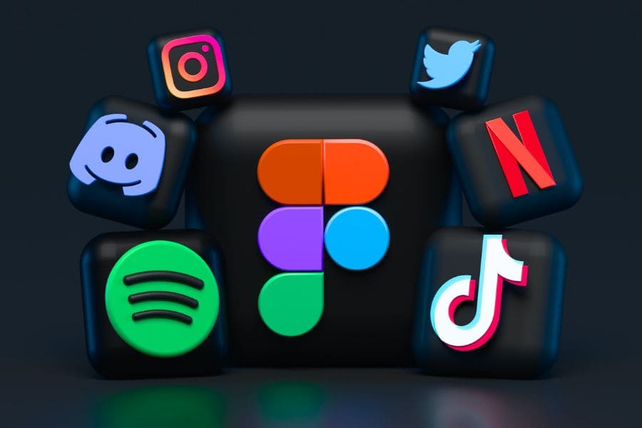 a group of social media icons on black cubes stacked together