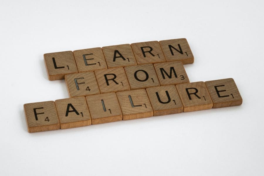 lettered tiles spelling out "learn from failure"
