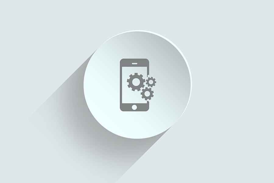 smartphone logo with gears on white plate