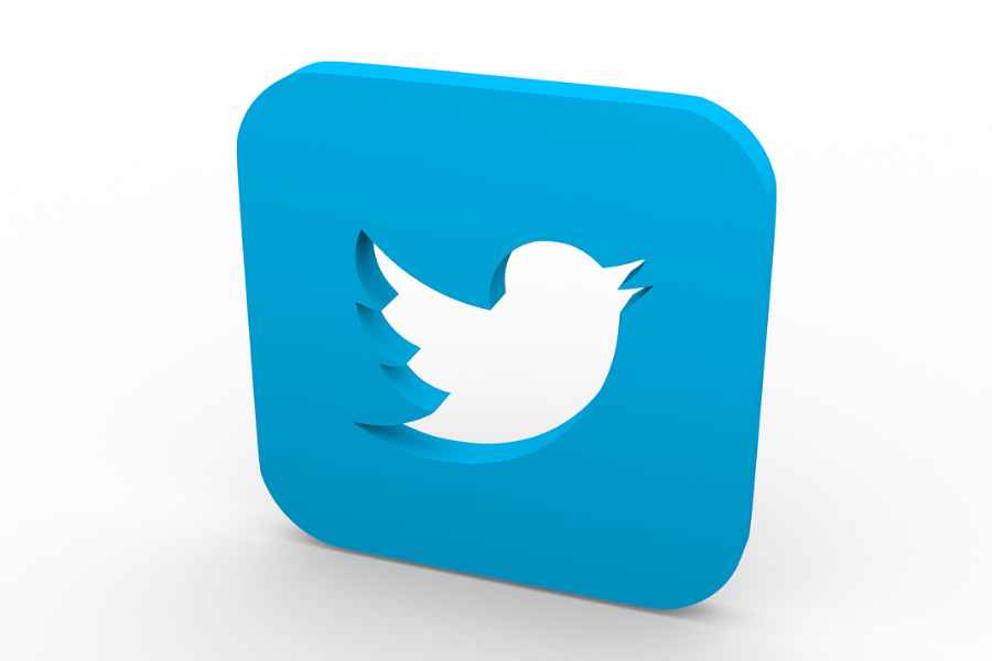3D twitter logo standing on a white background