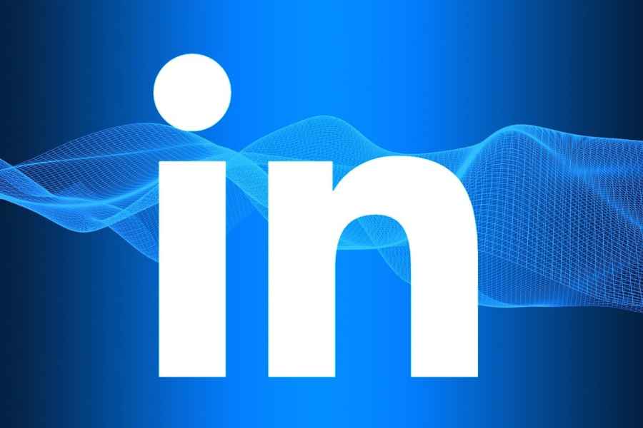 linkedin white letters on blue background with wavey texture