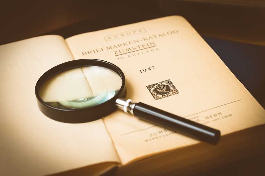 magnify glass on a book